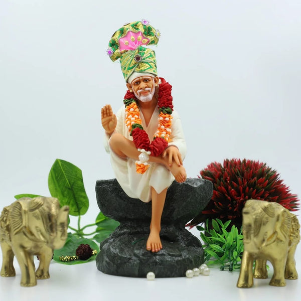 Saibaba Sitting on Stone Idol, Orange, 9 Inch Hemant Art
