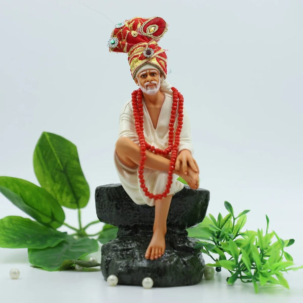 Saibaba Sitting on Stone Idol, Orange, 7.5 Inch Hemant Art
