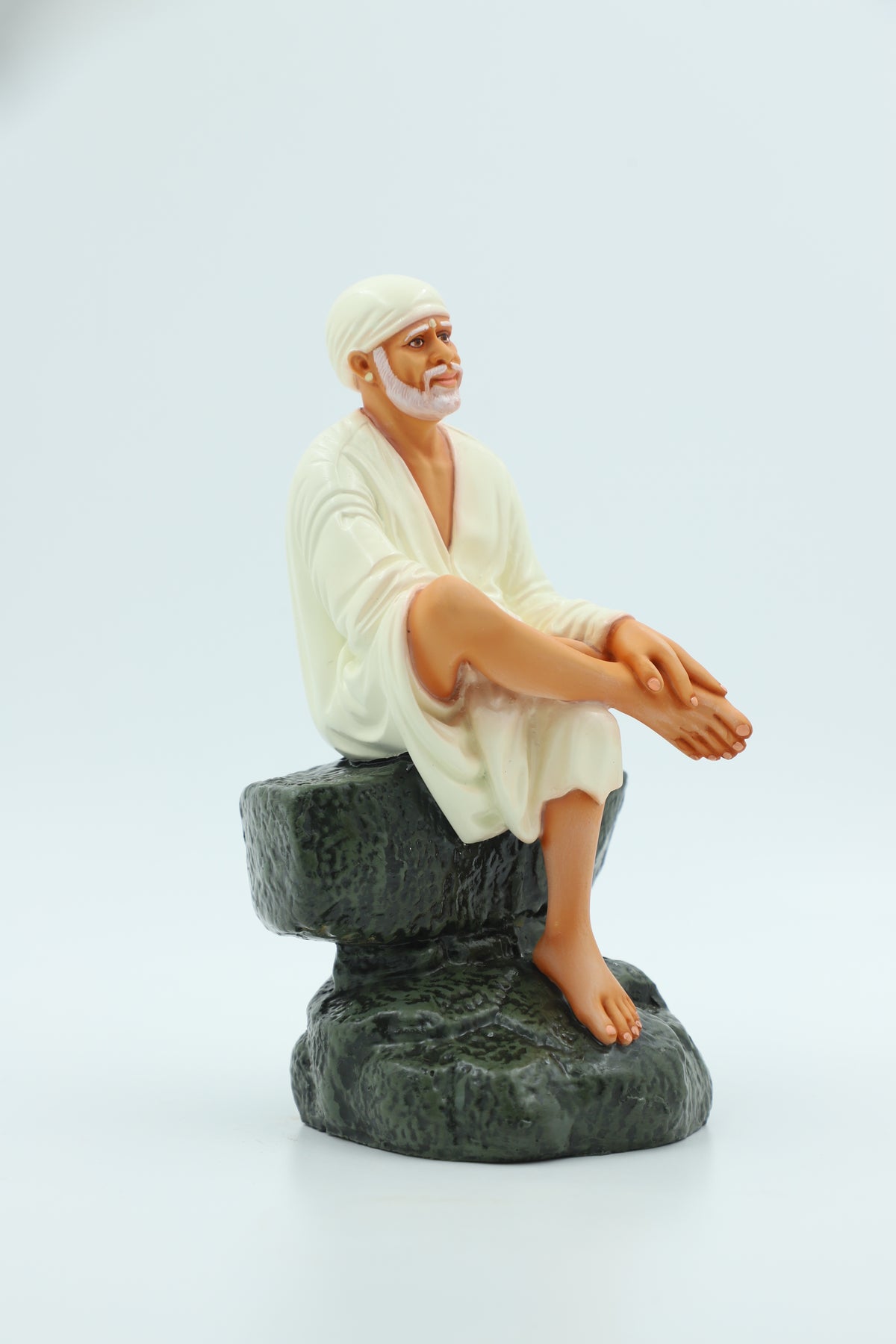 Saibaba Sitting on Stone Idol, Orange, 7.5 Inch Hemant Art