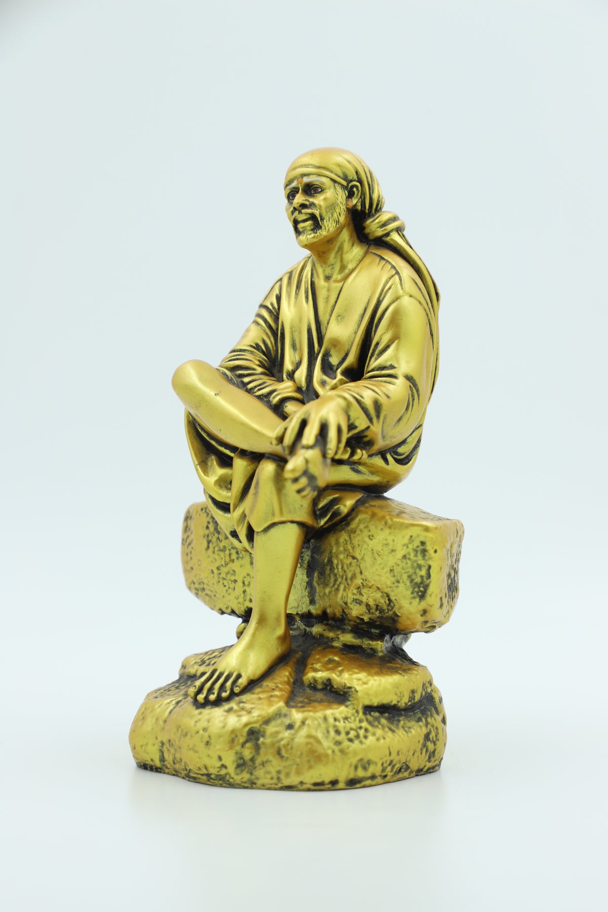 Saibaba Sitting on Stone Idol, Orange, 7.5 Inch Hemant Art