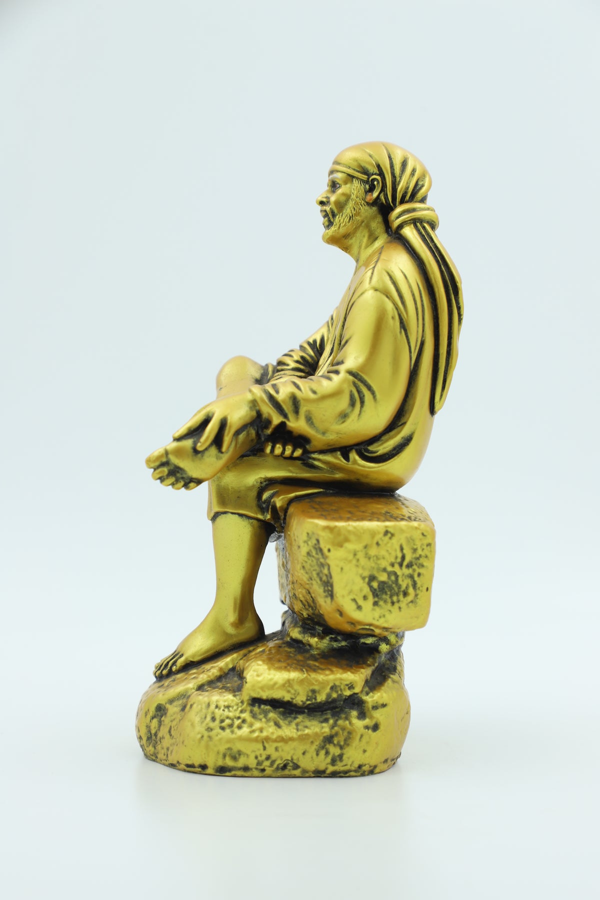 Saibaba Sitting on Stone Idol, Orange, 7.5 Inch Hemant Art