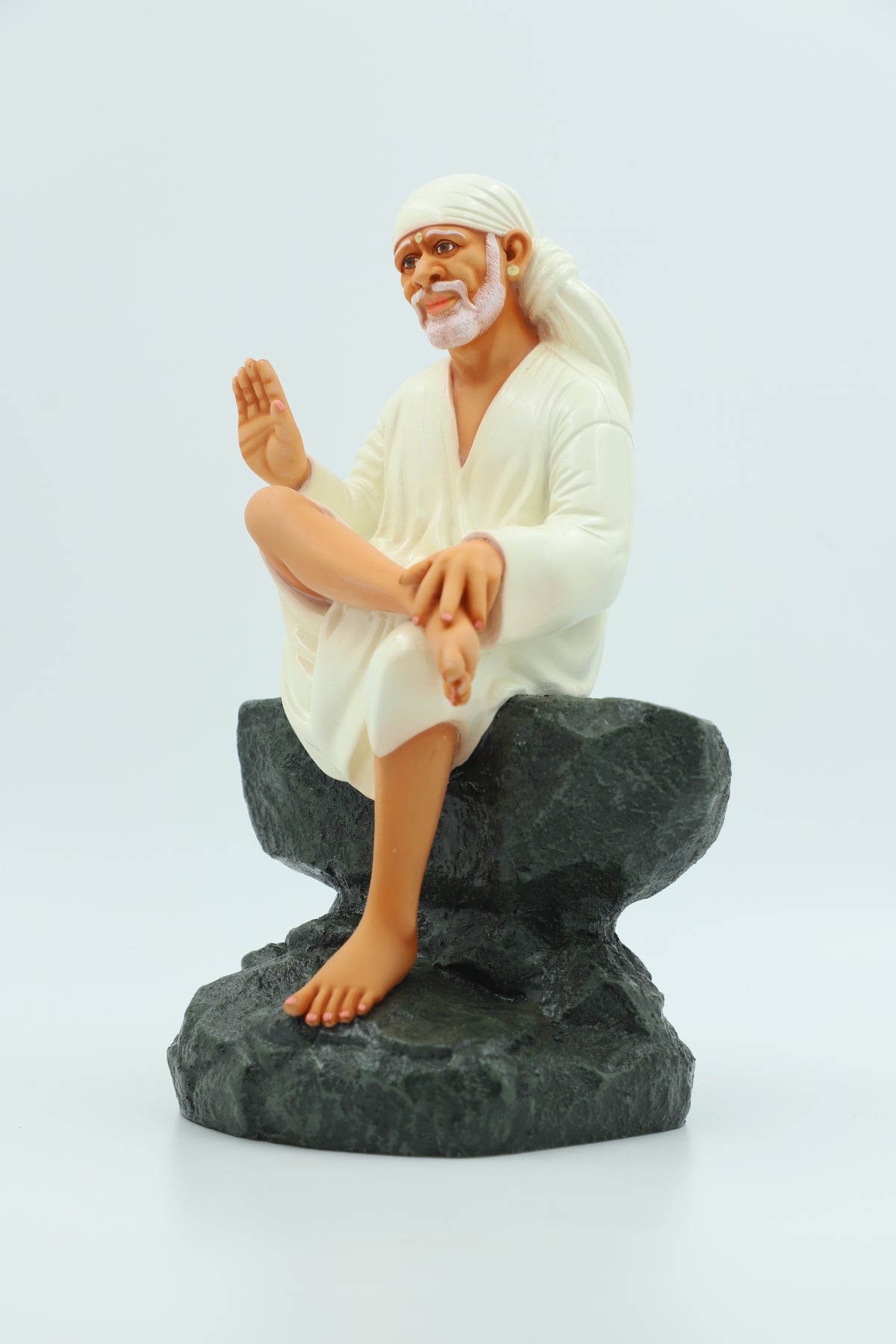 Saibaba Sitting on Stone Idol, Orange, 9 Inch Hemant Art