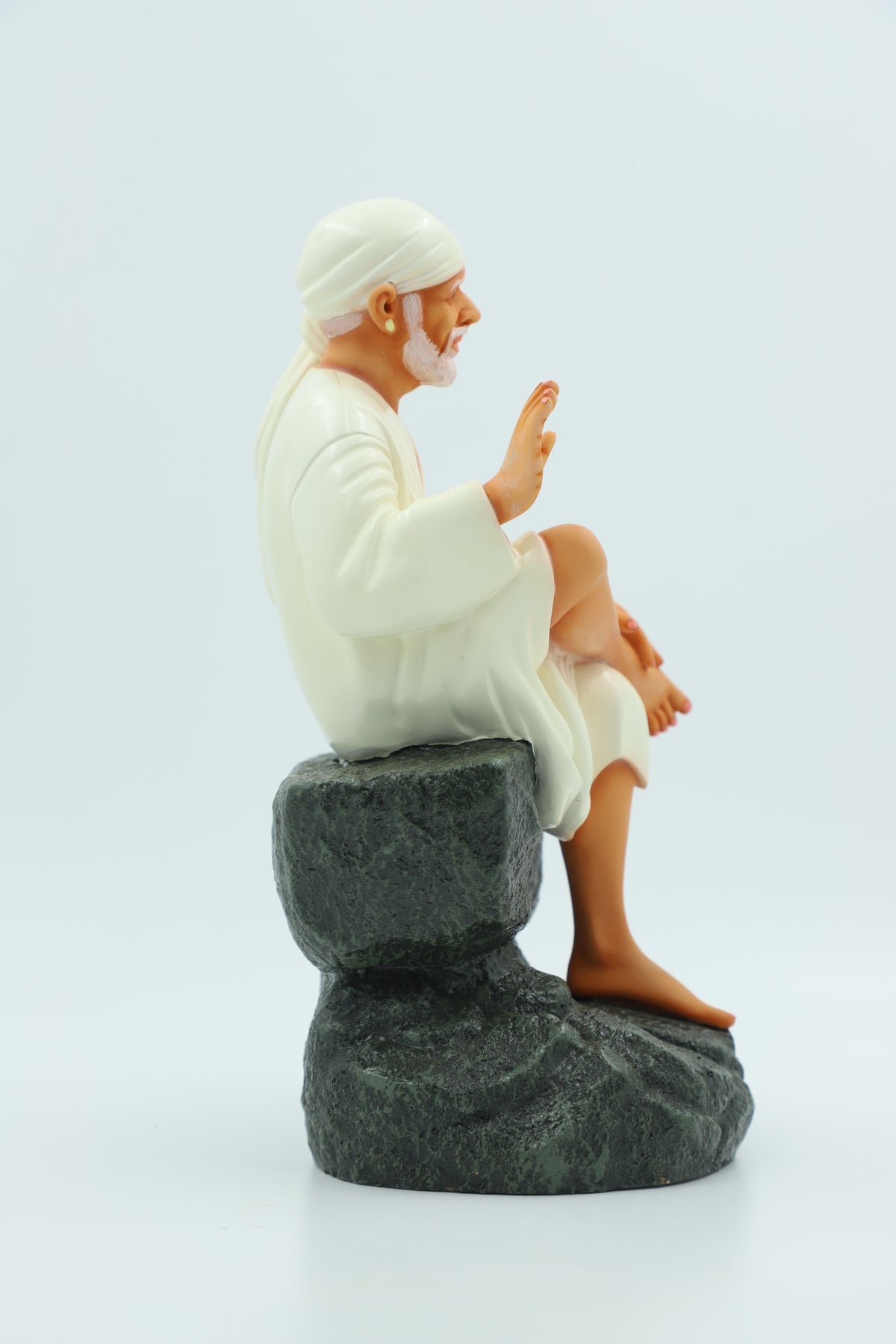 Saibaba Sitting on Stone Idol, Orange, 9 Inch Hemant Art