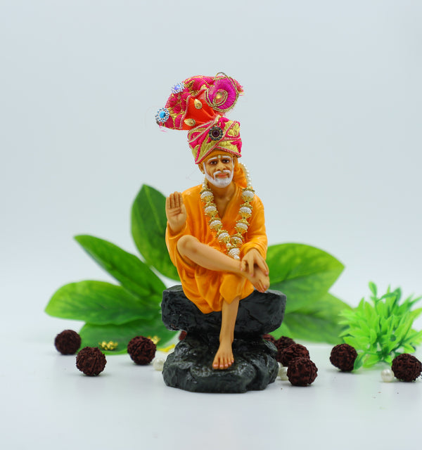 Sai Baba Idol Sitting on Stone, Aashirwad Hand – Orange 6.5 Inch Hemant Art