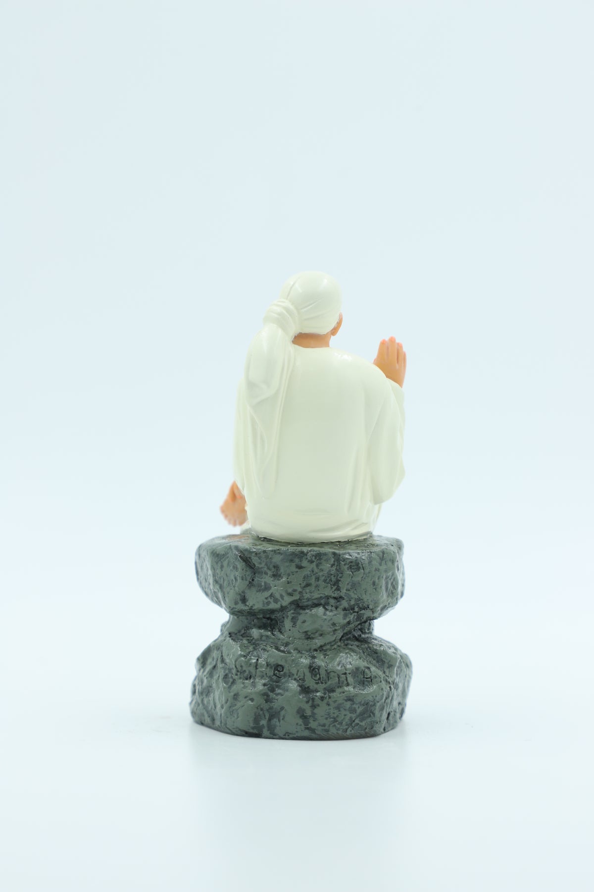 Sai Baba Idol Sitting on Stone, Aashirwad Hand – White 6.5 Inch Hemant Art