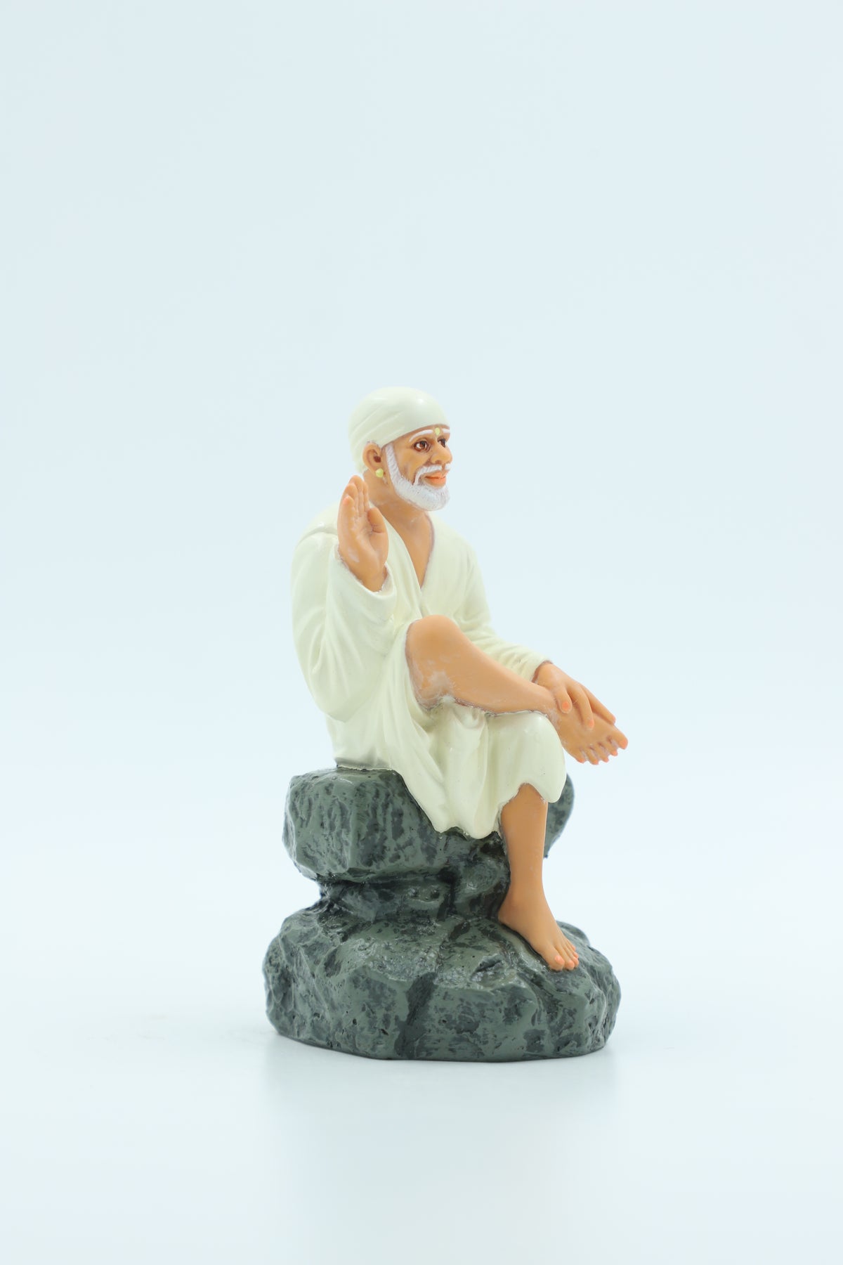 Sai Baba Idol Sitting on Stone, Aashirwad Hand – White 6.5 Inch Hemant Art