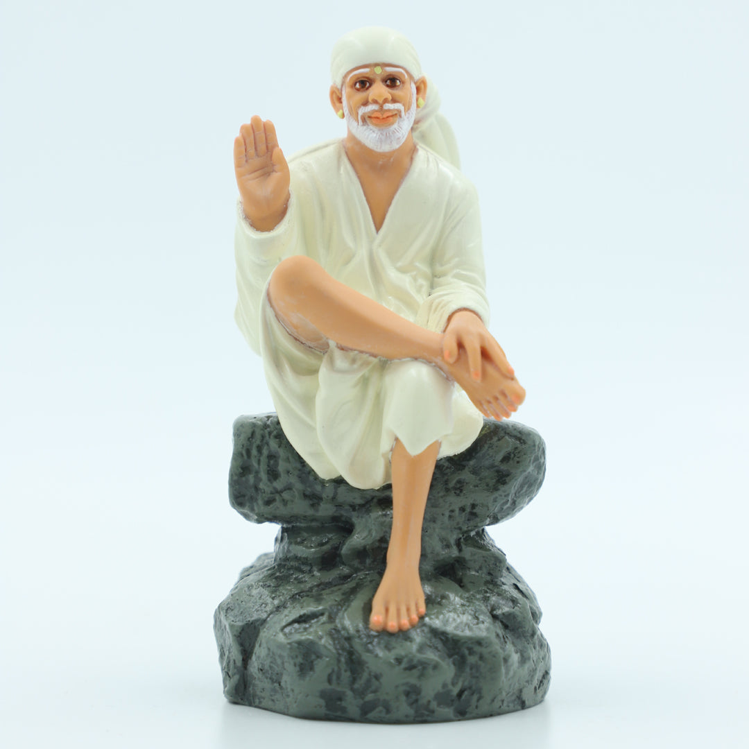 🙏 Hemant Art Shirdi Sai Baba Idol🛕 – Sitting on Stone, Aashirwad Hand – 4.5 Inch (White ), Handcrafted Resin Murti