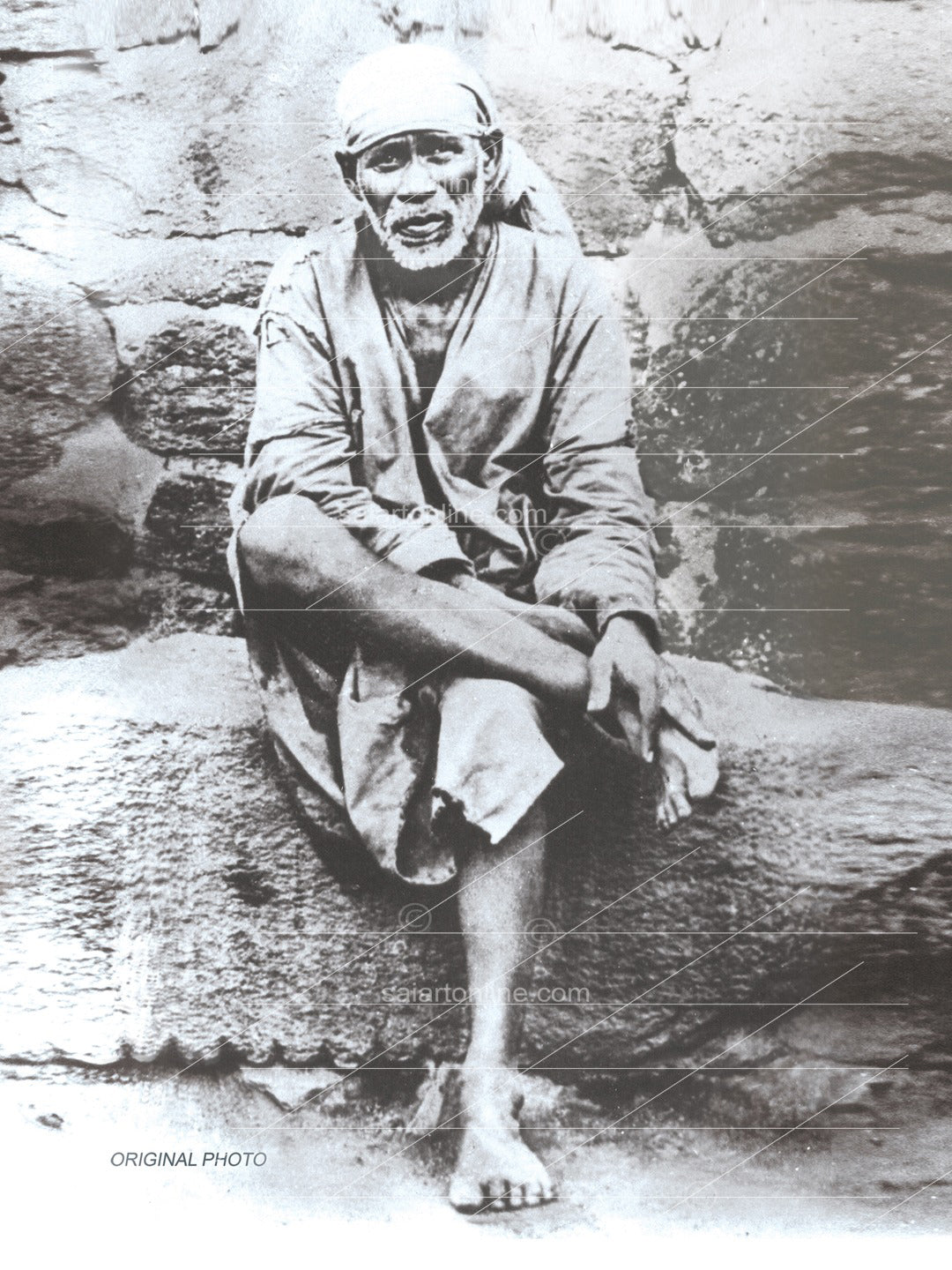 Shirdi Sai Baba Original Photo Sitting on Stone Canvas Reprint | Hemant Art