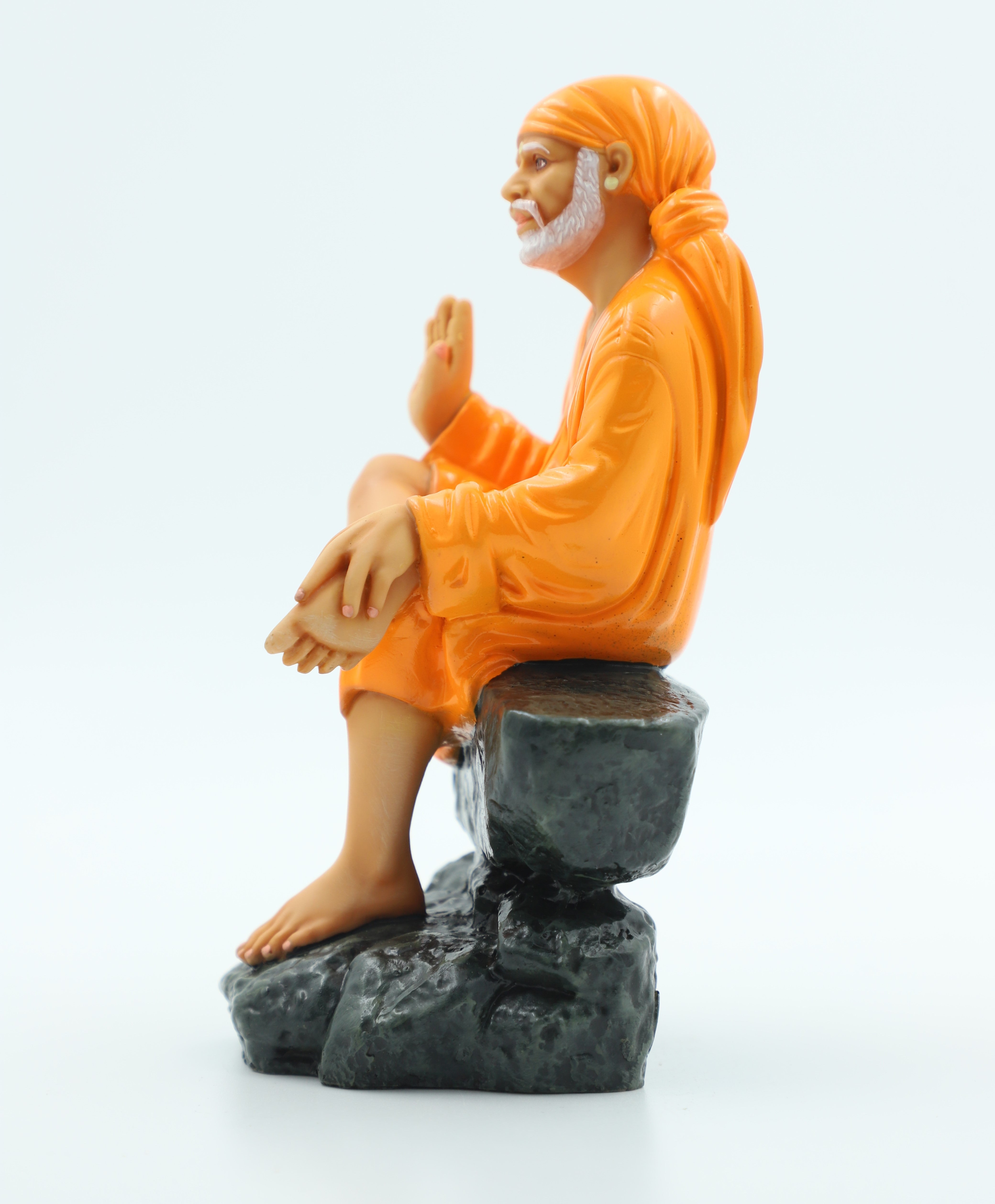 🙏 Hemant Art Shirdi Sai Baba Idol🛕 – Sitting on Stone, Aashirwad Hand – 6.5 Inch (Orange ), Handcrafted Resin Murti