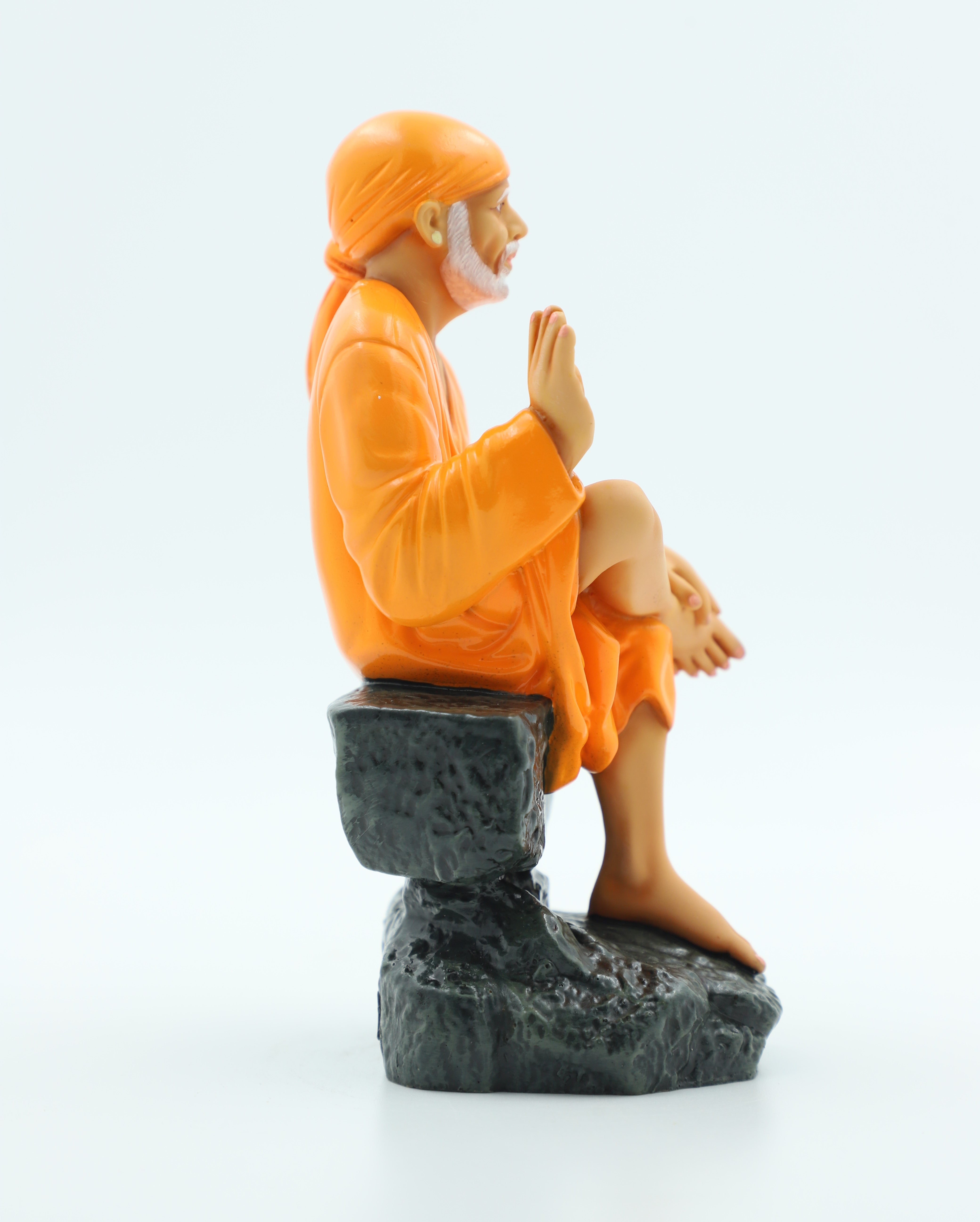 🙏 Hemant Art Shirdi Sai Baba Idol🛕 – Sitting on Stone, Aashirwad Hand – 6.5 Inch (Orange ), Handcrafted Resin Murti