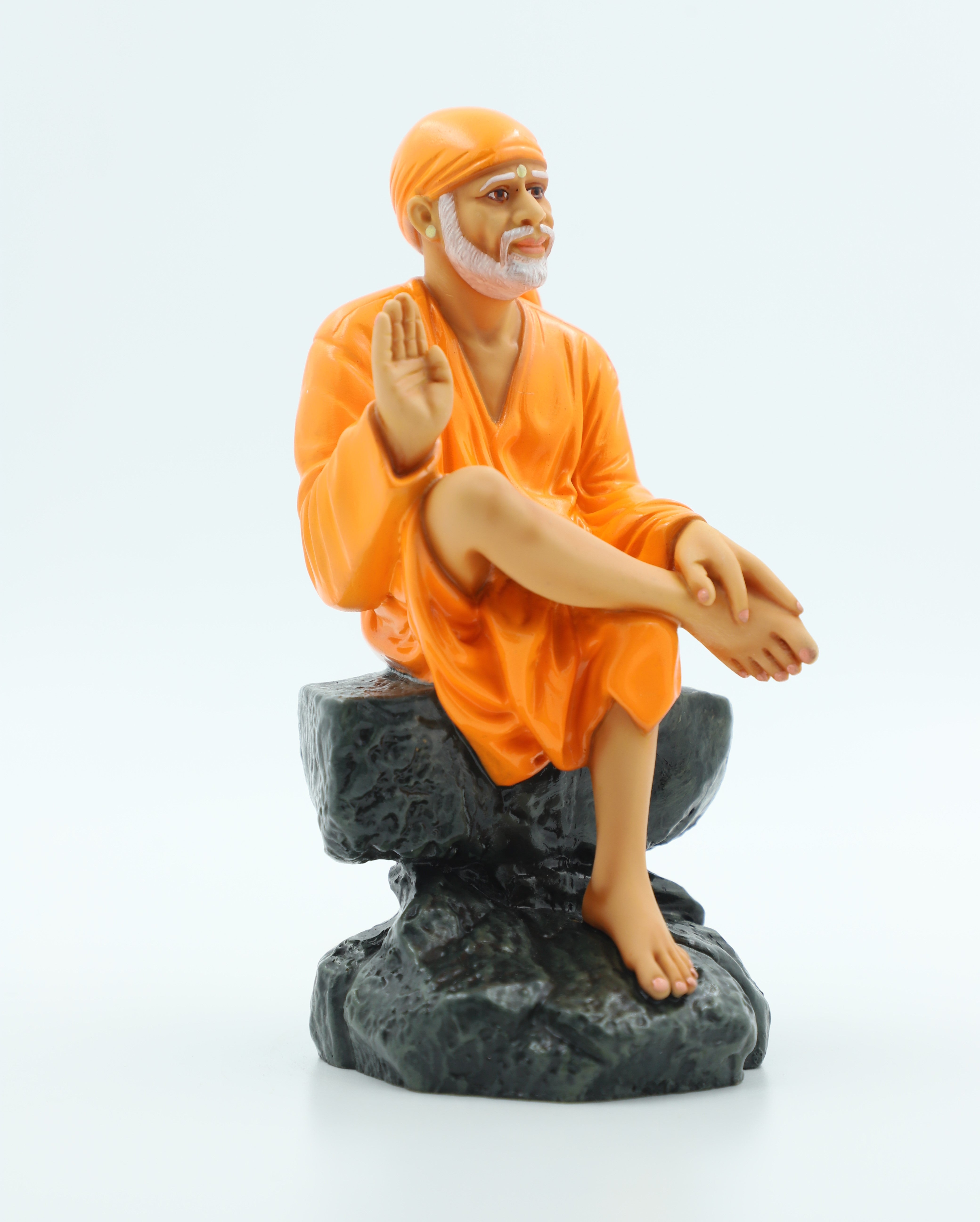 🙏 Hemant Art Shirdi Sai Baba Idol🛕 – Sitting on Stone, Aashirwad Hand – 6.5 Inch (Orange ), Handcrafted Resin Murti