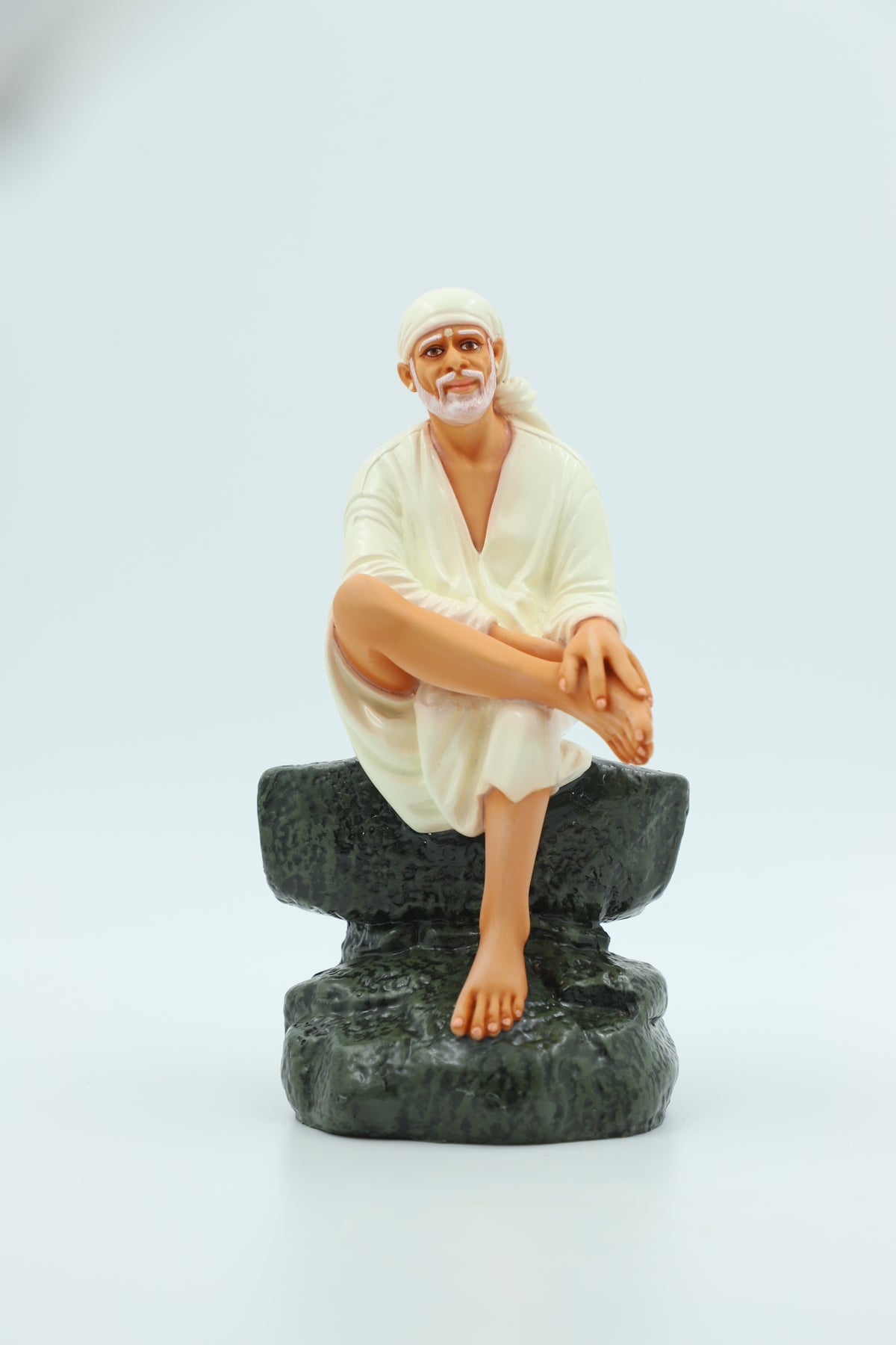 Saibaba Sitting on Stone Idol, Orange, 7.5  Inch Hemant Art