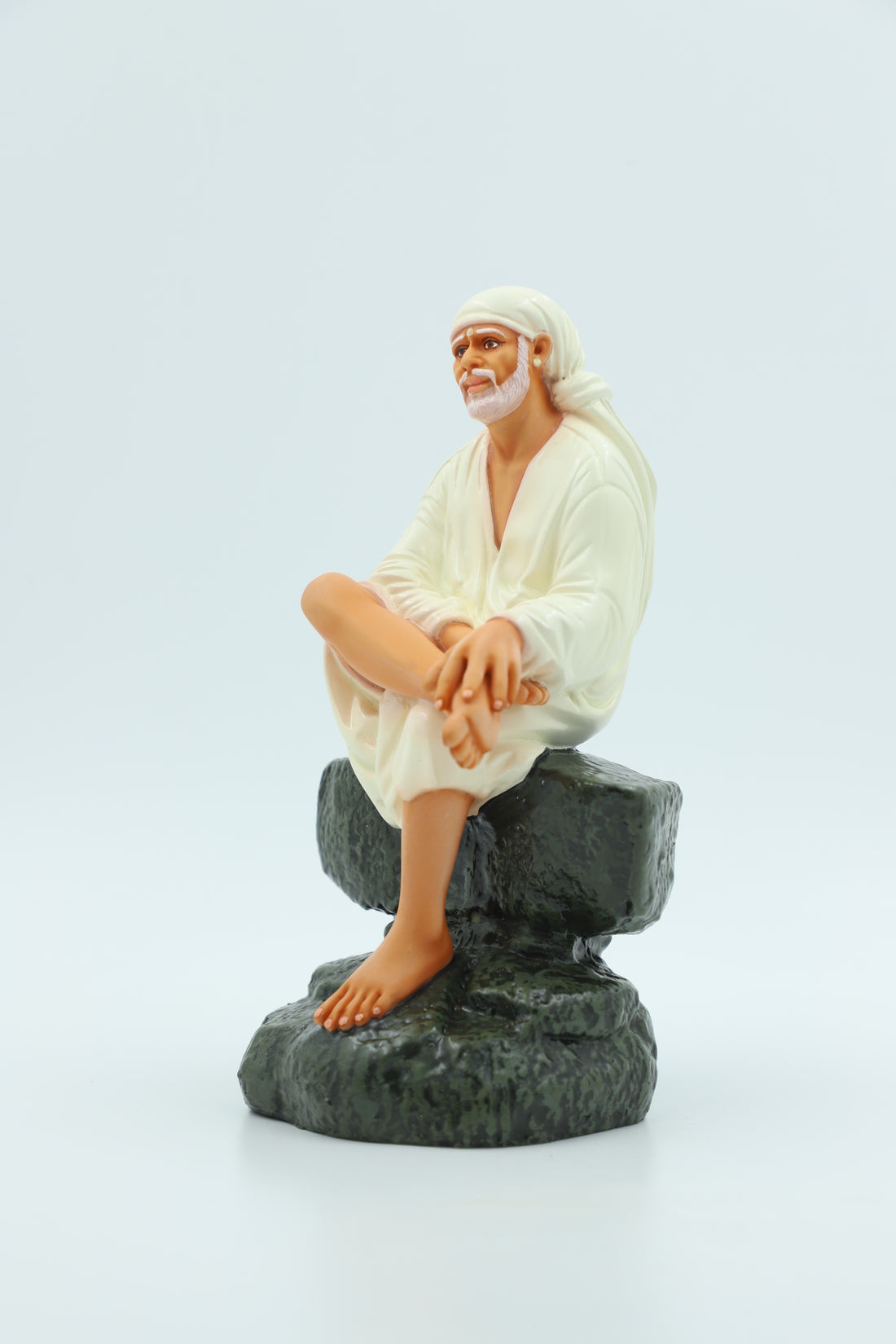 Saibaba Sitting on Stone Idol, Orange, 7.5  Inch Hemant Art