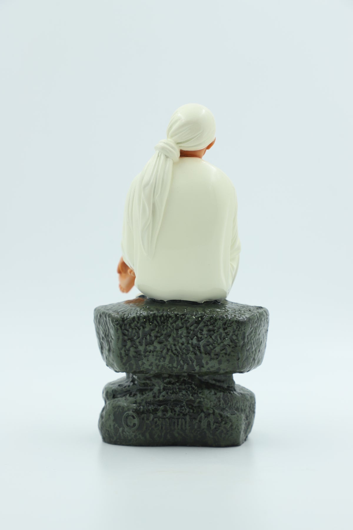Saibaba Sitting on Stone Idol, Orange, 7.5  Inch Hemant Art