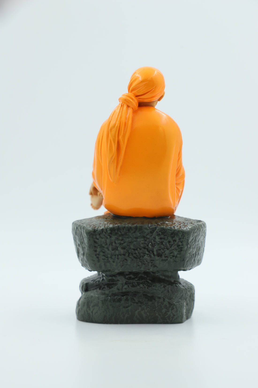 Saibaba Sitting on Stone Idol, Orange, 7.5  Inch Hemant Art
