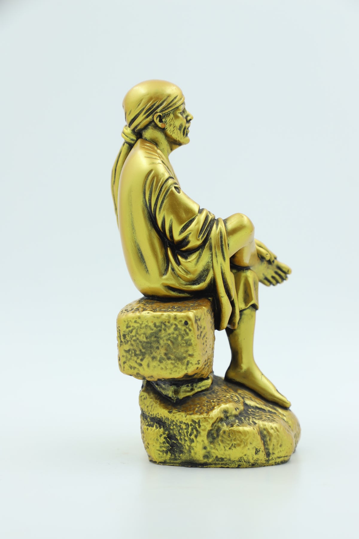 Saibaba Sitting on Stone Idol, Orange, 7.5  Inch Hemant Art