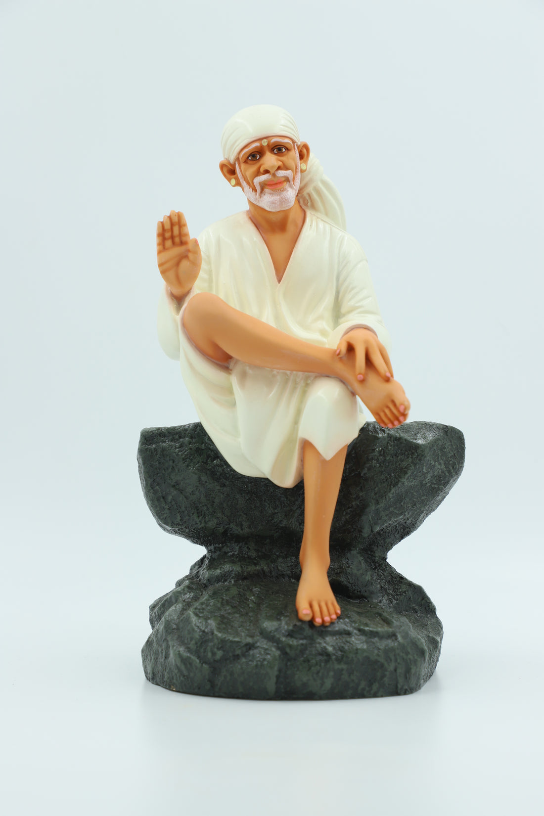 Saibaba Sitting on Stone Idol, Orange, 9 Inch Hemant Art