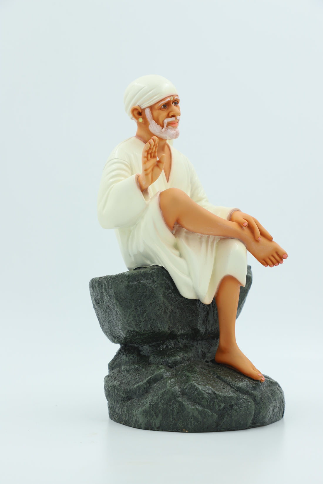 Saibaba Sitting on Stone Idol, Orange, 9 Inch Hemant Art
