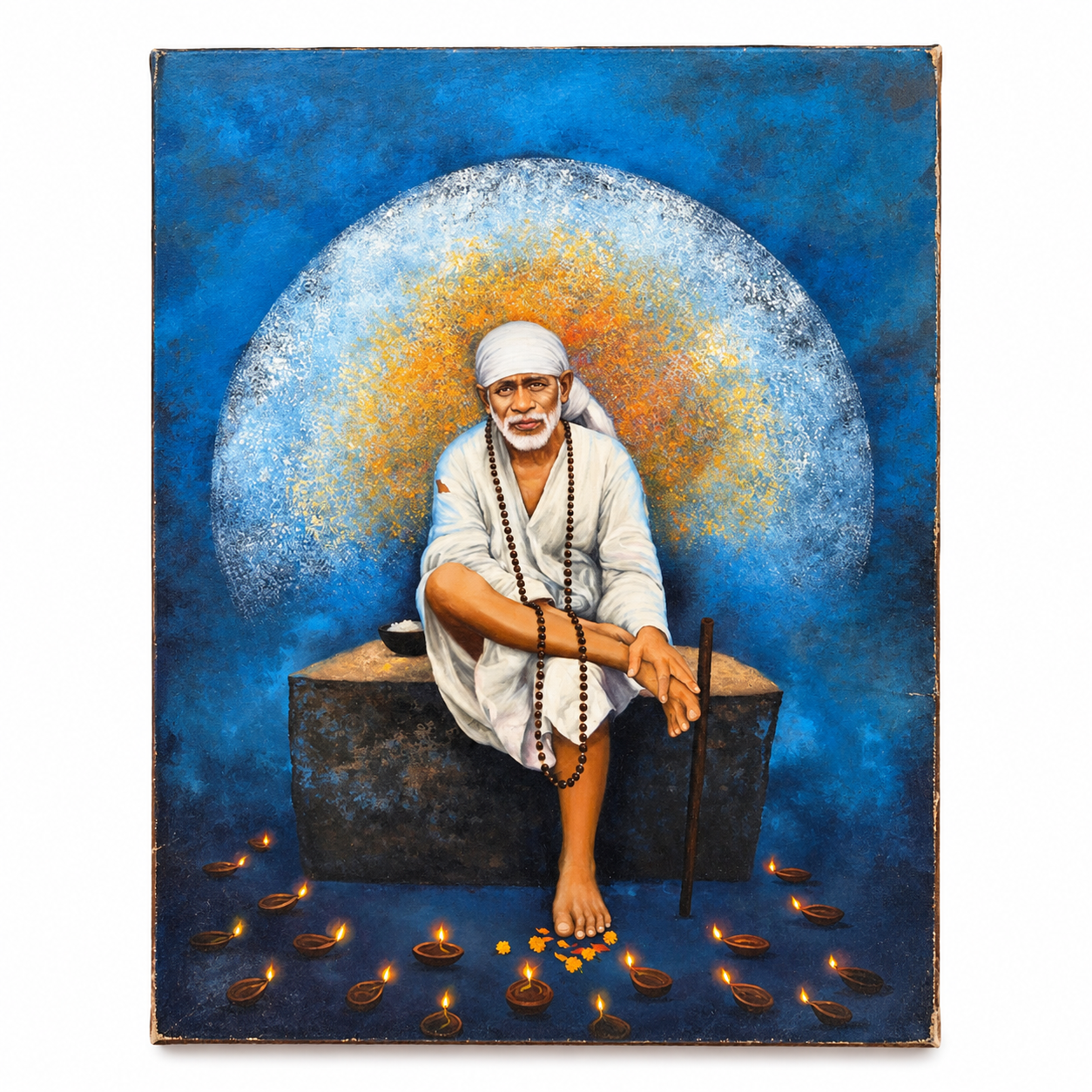 sai baba sitting on stone blessing pose
