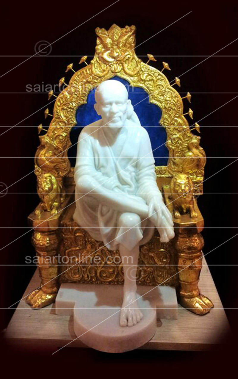 Sai-baba-white-statue-sitting-on-blue-golden-sinhasan